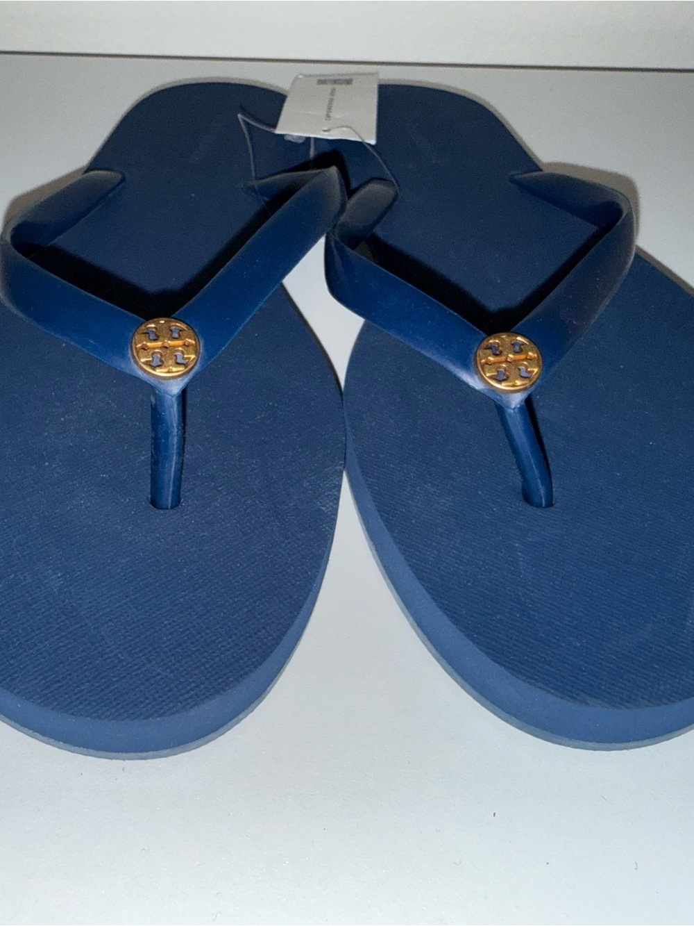 Tory Burch Navy Blue Flip Flop Sandals with Gold Logo Medallions